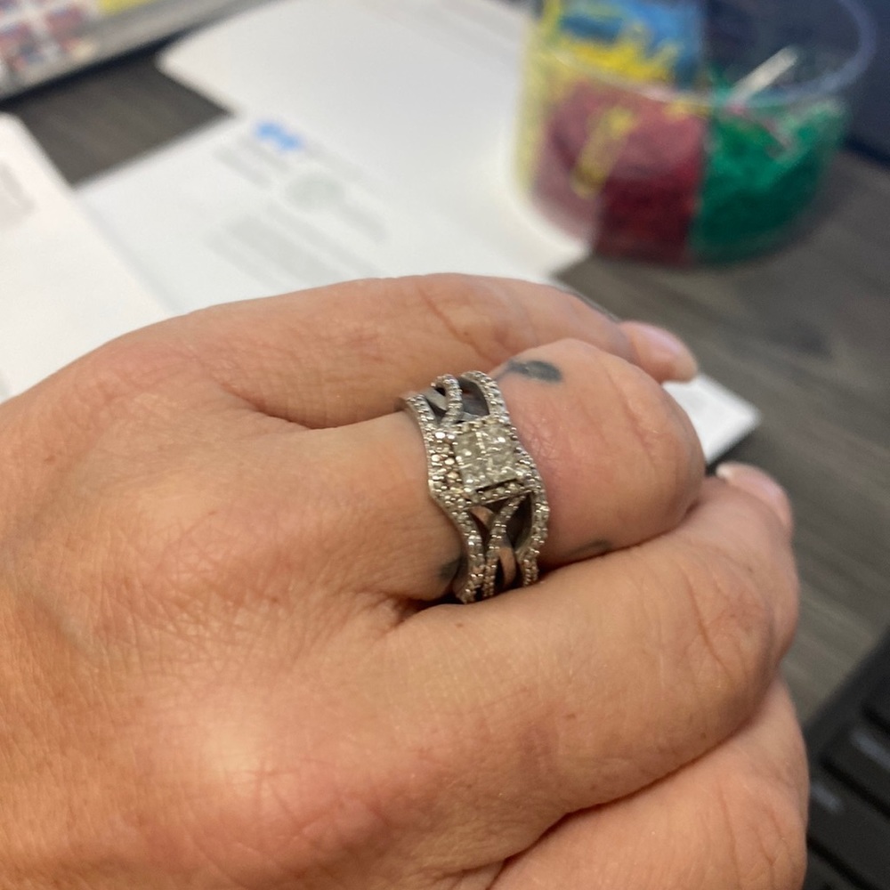Beautiful authentic diamond ring set in sterling silver.